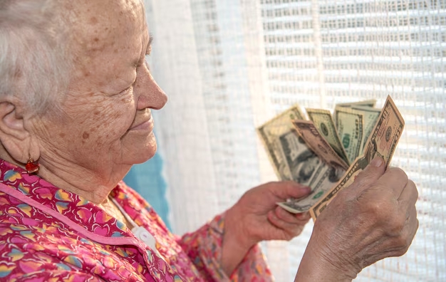 Happy pet owner with golden retriever